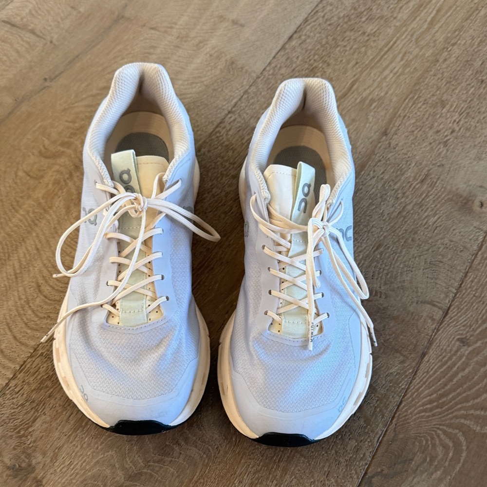 On Running Cream and Lilac Athletic Shoes